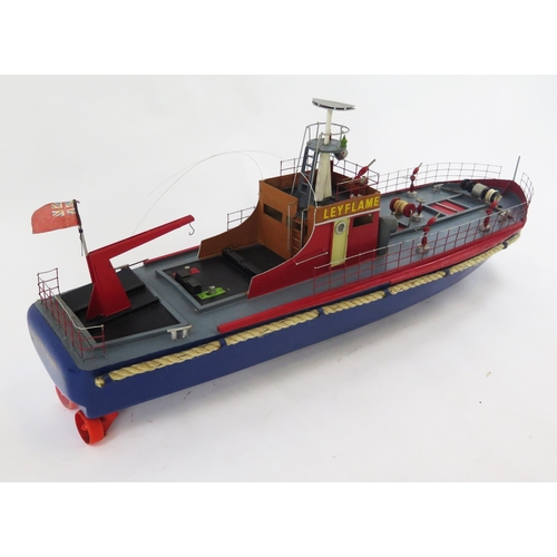 1913 - A model fire boat 'Leyflame' with blue painted hull and grey/red superstructures, with two e/l motor... 