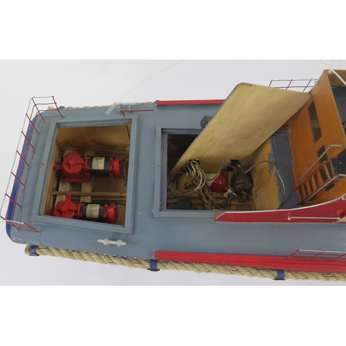 1913 - A model fire boat 'Leyflame' with blue painted hull and grey/red superstructures, with two e/l motor... 