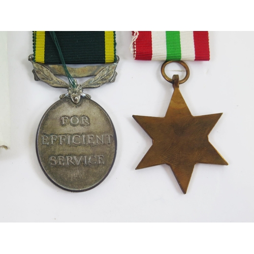 1916 - A Territorial Efficiency Medal to 1464427. Bdr. H W Harris. RA. an Italy Star, with box of issue.