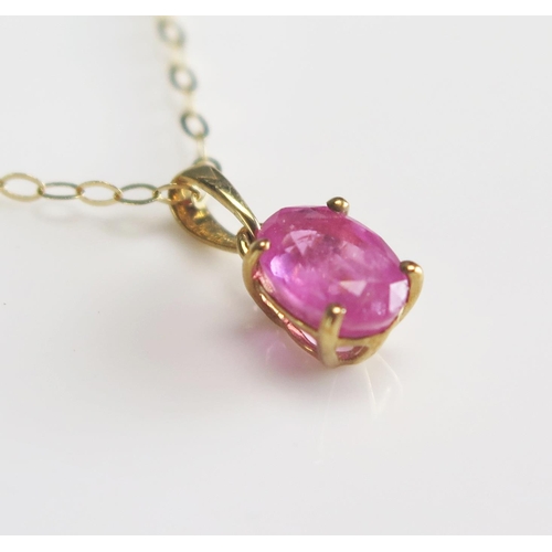 289 - A pink sapphire pendant in 9ct gold mount and 9ct gold chain, length of chain 225mm.