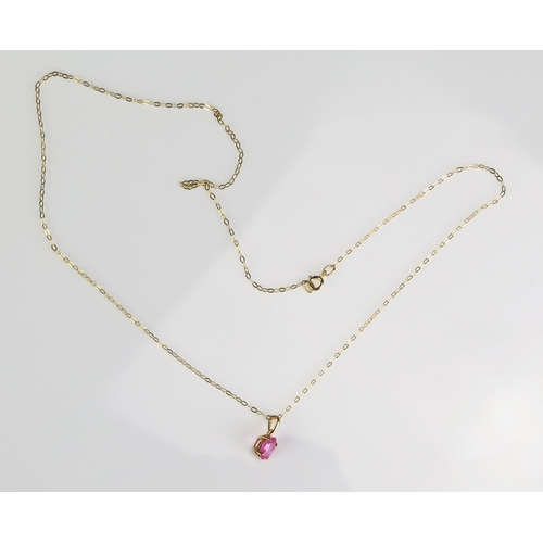 289 - A pink sapphire pendant in 9ct gold mount and 9ct gold chain, length of chain 225mm.