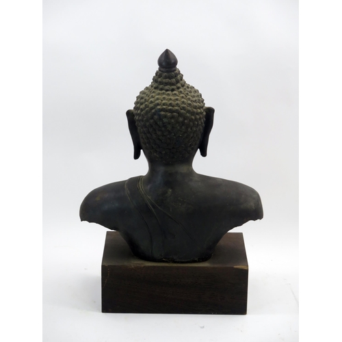 1760 - A South East Asian  bronze torso of Buddha, mounted on a rectangular plinth base, overall height 63c... 