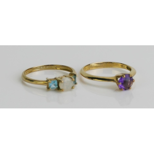 134 - A 9ct Gold and Amethyst Solitaire Ring (size M.5, Birmingham marks, 1.93g) and a 9ct gold gem set ri... 