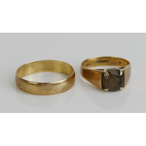 168 - A 9ct Gold Wedding Band (size Q.5, 1.85g) and a 9ct gold and smoky quartz ring (size K.75, 2.65g