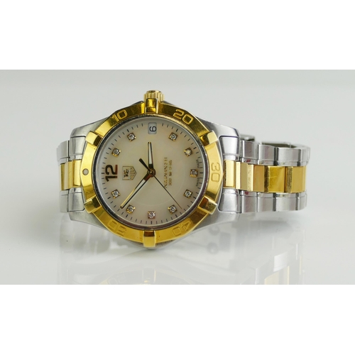 187 - A TAG HEUER Aquaracer Lady's Steel and Gold Wristwatch with mother of pearl diamond set dial, with p... 