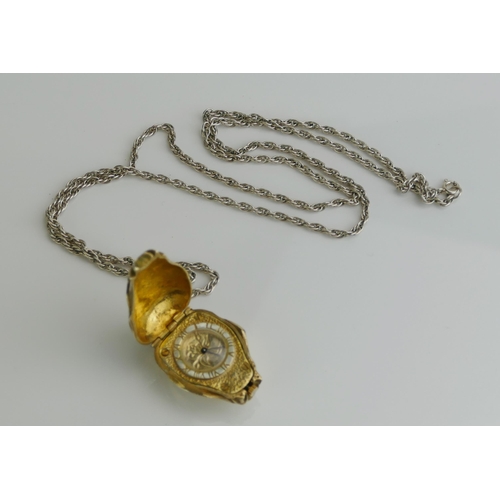 191 - A Heavy Cast Silver Gilt Watch Pendant in the form of a rose and on a silver chain, 54.49g gross. Ne... 