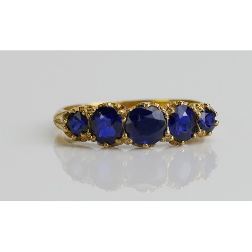 261 - An Antique 18ct Gold and Natural Sapphire Five Stone Ring, size M, London 1907, 2.88g