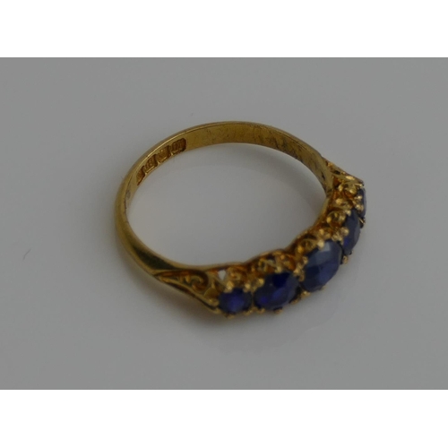 261 - An Antique 18ct Gold and Natural Sapphire Five Stone Ring, size M, London 1907, 2.88g