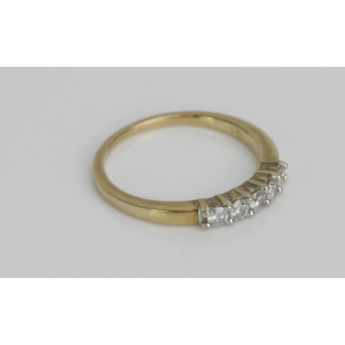 29 - A 9ct Gold and Diamond Five Stone Ring, c. 2.4mm brilliant round cuts, size K.75, hallmarked, 1.78g