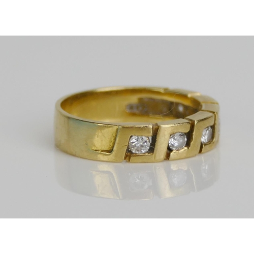 35 - An 18ct Gold and Diamond Six Stone Half Eternity Ring, c. 2.25mm brilliant round cuts, size L, 4.06g