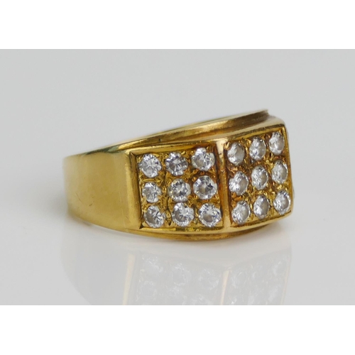 41 - An 18ct Gold and Diamond Ring, set with 2.3mm brilliant cuts arranged in three panels of nine, size ... 