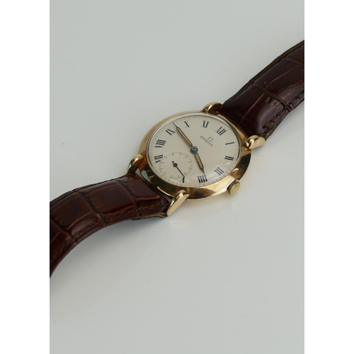 6 - An Omega 14K Gold Cased Gent's Dress Wristwatch, 35.5mm case with enamel dial having Roman numerals ... 