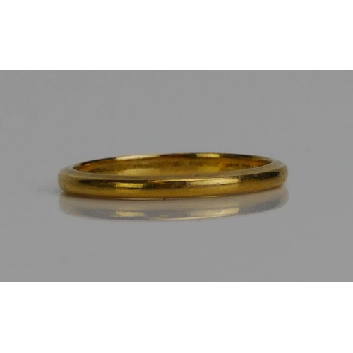 64 - A 22ct Gold Plain Wedding Band, c. 1.8mm wide, size J, London hallmark, 1.91g