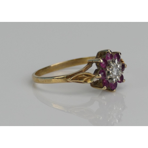 92 - A 9ct Gold, Ruby and Diamond Cluster Ring, size M.5, hallmarked, 1.7g