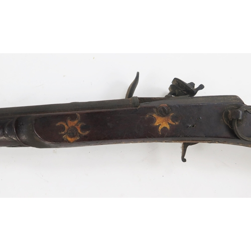 1825A - A North African Kabyle style flintlock gun with 87cm half stocked barrel, steel furniture with bone ... 