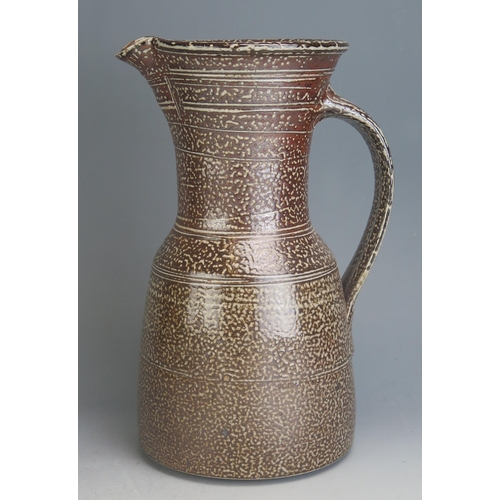 1015 - A Peter Starkey (b. 1945) Studio Pottery Stoneware Jug,28cm high, paper label to base