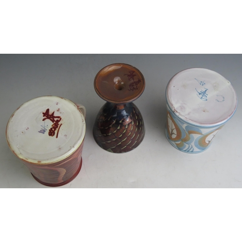 1018 - An Alan Caiger Smith (1930-2020) Studio Pottery Goblet (13.5cm) and two mugs, underglaze painted mar... 