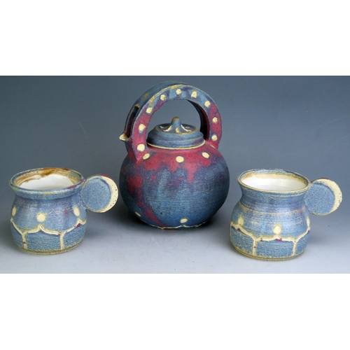 1047 - A Studio Pottery Teapot (18.5cm high, impressed crescent mark to base) and two mugs