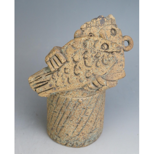 1051 - A Studio Pottery Stoneware Figural Pot with cover modelled as a man with a fish, 18cm tall, unmarked