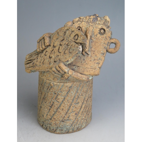 1051 - A Studio Pottery Stoneware Figural Pot with cover modelled as a man with a fish, 18cm tall, unmarked