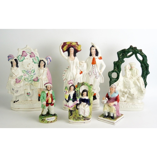 1074 - Four assorted Staffordshire pottery flat back figures, together with a Staffordshire figurine 'The C... 