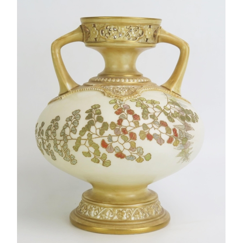 1095 - A Royal Worcester blush ivory vase, with compressed body, and pierced neck, decorated with fern leaf... 