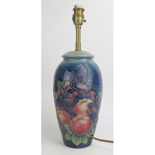 1113 - A Moorcroft pottery table lamp, decorated with finches and berries, overall height 38.5cm high