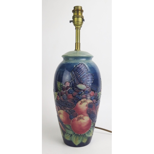 1113 - A Moorcroft pottery table lamp, decorated with finches and berries, overall height 38.5cm high