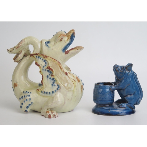 1130 - A Brannan pottery jug in the form of a grotesque dragon, signed and dated 1891, 14cm high, together ... 