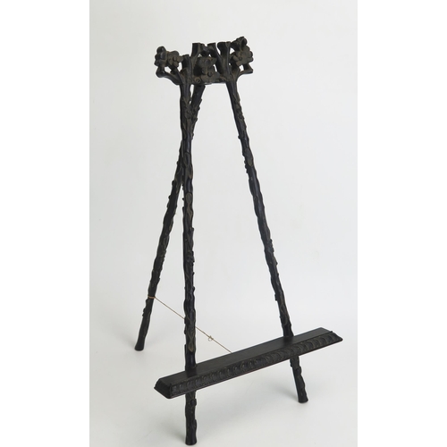 1167 - An Antique Chinese Rosewood Easel with carved prunus decoration, 40cm from shelf to top