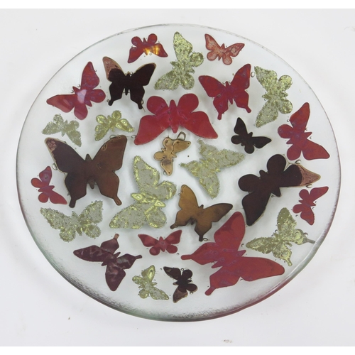 1199B - Jo Downs, an art glass dish decorated with butterflies, 20cm diameter