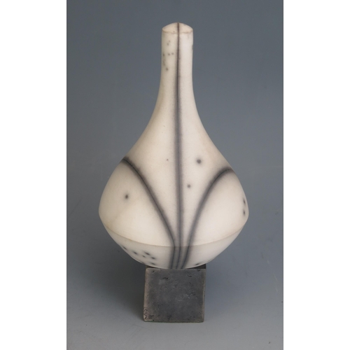 1219 - Tim Andrews (b. 1960) _ A Raku Sculptural Vase Form on a square base, 23cm high, impressed mark