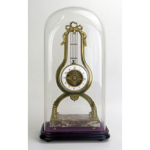 1252 - A Louis XVI style gilt brass lyre timepiece, with 9cm Arabic chapter ring, the frame surmounted with... 