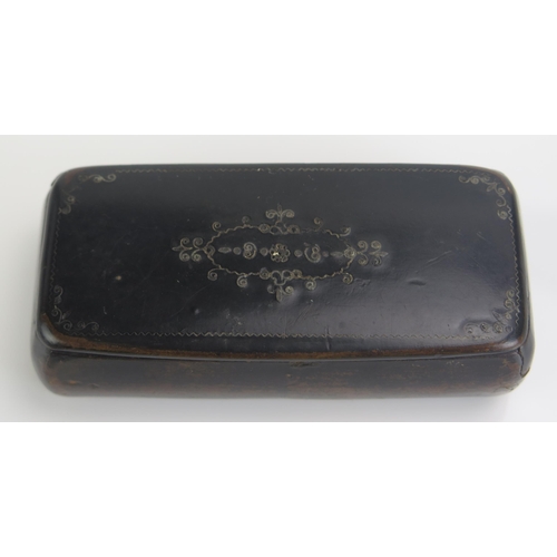 1266 - A 19th century papier mache snuff box of rectangular outline 10cm long.