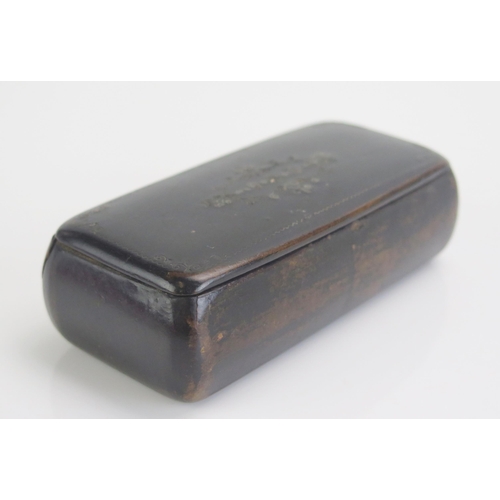 1266 - A 19th century papier mache snuff box of rectangular outline 10cm long.