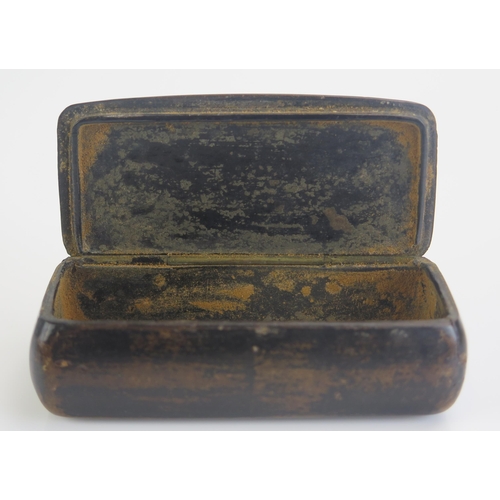 1266 - A 19th century papier mache snuff box of rectangular outline 10cm long.