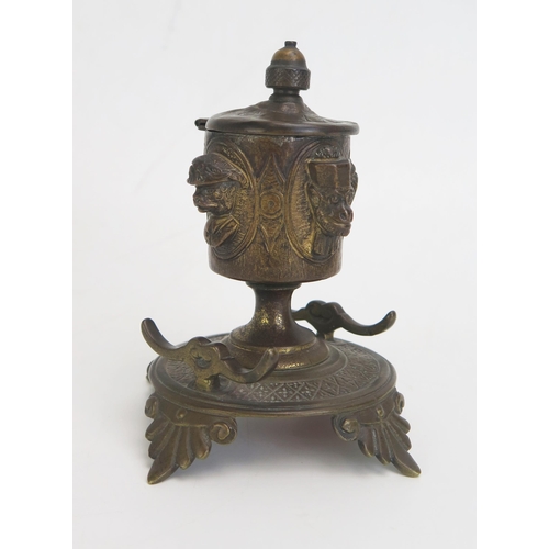 1270 - A late 19th century bronze pen and ink stand and cover, the hinged lid with acorn finial, the bowl d... 