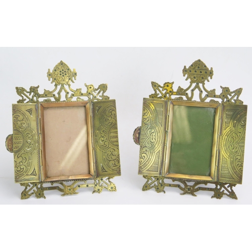 1271 - A pair of brass Gothic style easel photograph frames, with fret cut frame with two hinged doors, enc... 