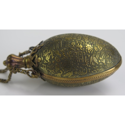 1274 - A late Victorian brass  egg shaped chatelaine scent bottle and stopper decorated with Egyptianesque ... 