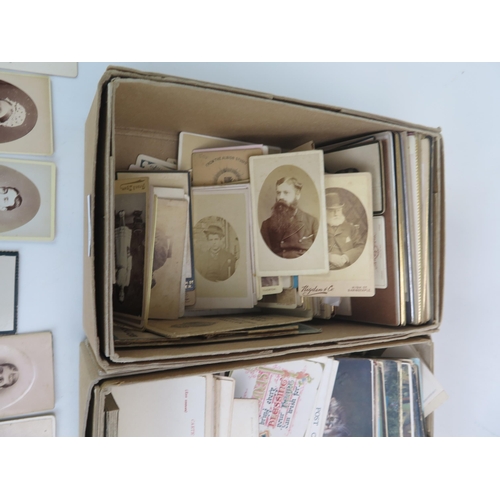 1500B - A collection of assorted Victorian and later carte de visite contained in two boxes,