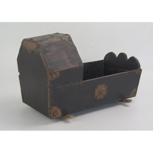 1609 - A 19th century stained wooden and brass bound rocking crib, with arched hood, 41cm long.