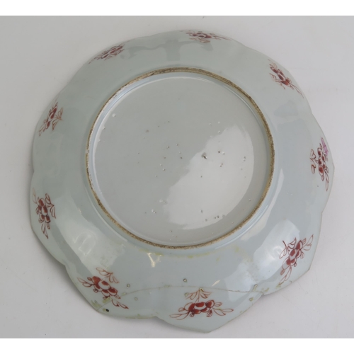 1632 - A 19th century Chinese porcelain petal-shaped dish with famille rose floral decoration. 23cm diamete... 