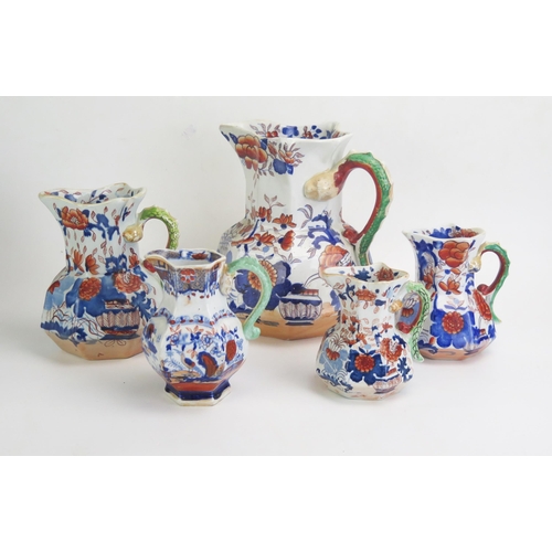 1653 - Five assorted Mason's Ironstone china graduated jugs with blue Mason's marks.