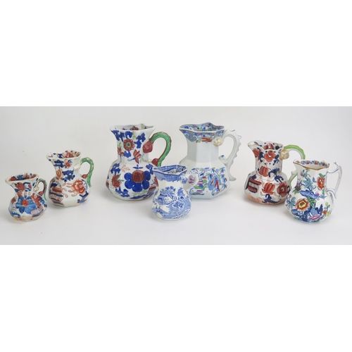 1654 - Seven assorted Ironstone china cream jugs,