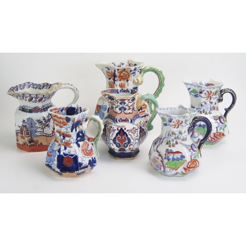 1655 - Six assorted Ironstone china jugs, various sizes. (6).