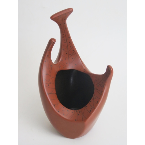 1684 - Colin Melbourne for Beswick pottery, model 1397, a free form vase, with liver red glaze and black in... 