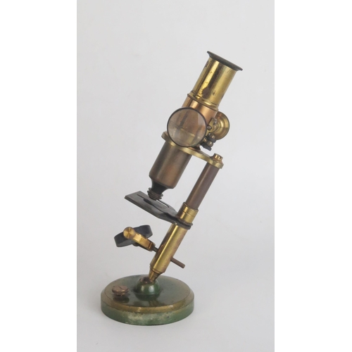 1723 - A Small Lacquered Brass Microscope in a mahogany case measuring 22x9.5cm