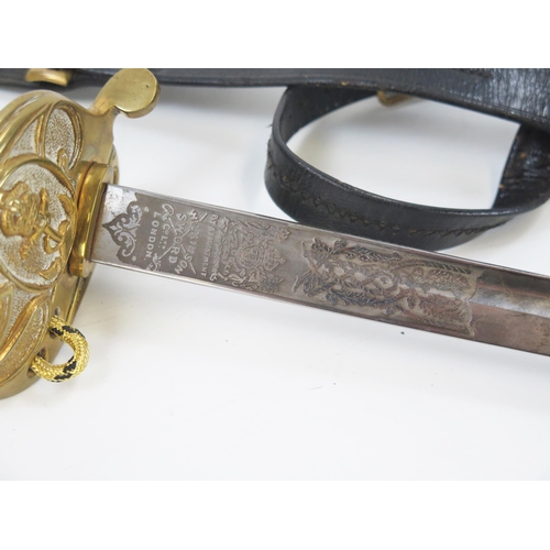 1800 - A George V naval officers sword, by Wilkinson, with 80cm fullered blade with etched Royal Cypher and... 