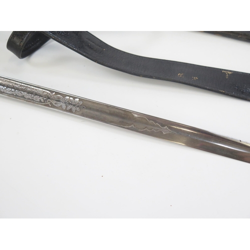 1800 - A George V naval officers sword, by Wilkinson, with 80cm fullered blade with etched Royal Cypher and... 