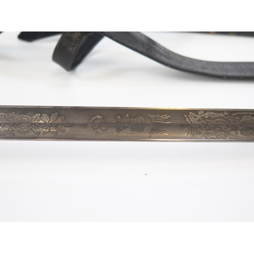 1800 - A George V naval officers sword, by Wilkinson, with 80cm fullered blade with etched Royal Cypher and... 